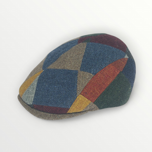 Coppola Duffy in lana Shetland lavorazione patchwork motivo quadri multicolor Coppola Duffy in lana Shetland lavorazione patchwork motivo quadri multicolor