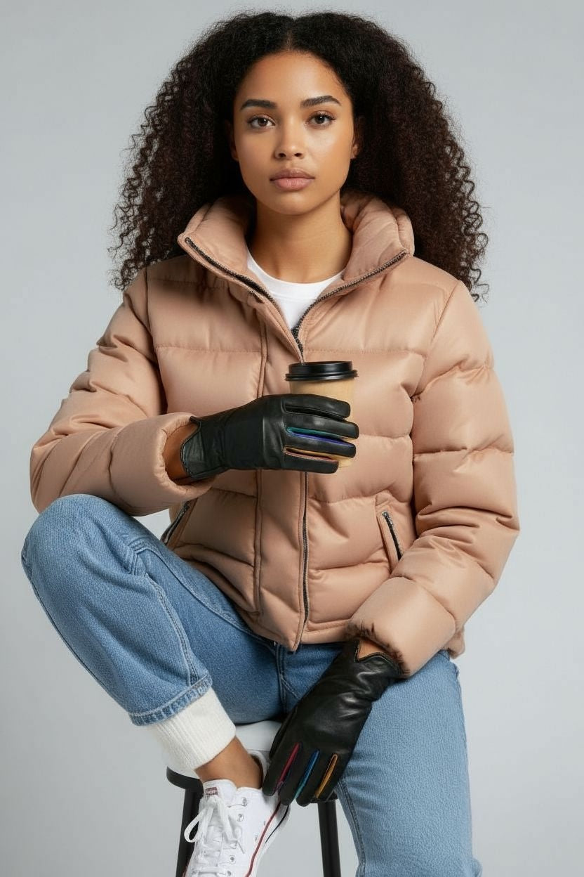 Black leather Arlecchino nappa fingerless gloves by Sbarià, showing smooth leather texture and stylish design.