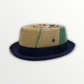 Sbarià pork pie hat made from coffee sack jute fabric, featuring a classic round crown and wide brim for stylish protection.