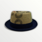 Sbarià pork pie hat made from coffee sack jute, featuring a classic design with a rounded crown and brim for stylish wear.