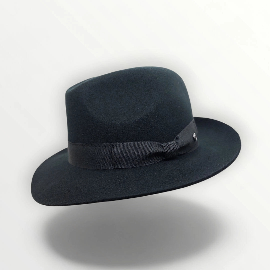 Black felt fedora hat with ribbon and bow, waterproof and crushable, by Sbarià, showcasing a stylish and practical accessory.