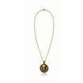 Silver and bronze pirate-themed necklace with black sails from BDG Accessories, featuring detailed nautical design.