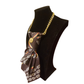 Vintage brown Cravatta Gioiello by Claudia De Rosa Jewelry with a clasp attachment and decorative jewel detail.