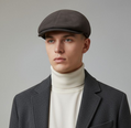 Coppola Duffy in vera pelle nabuk testa di moro by Sbarià, showcasing a stylish, textured brown hat with a wide brim.