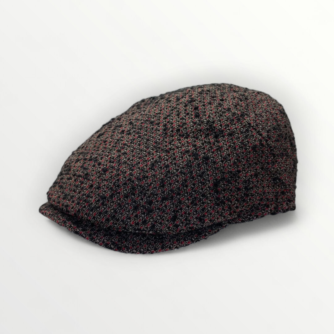 Sbarià Coppola Taormina in variegated brown wool, stylish and warm, with a classic rounded cap design.