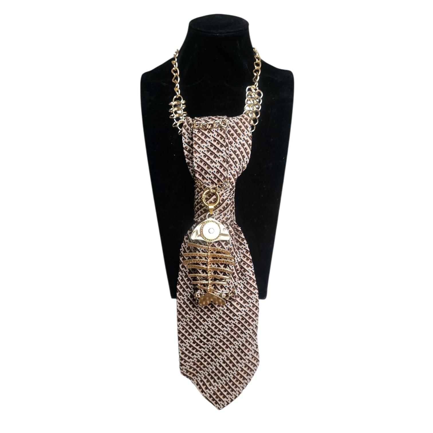 Gold fish-themed Cravatta Gioiello by Claudia De Rosa Jewelry displayed on a mannequin, featuring intricate jewelry design.