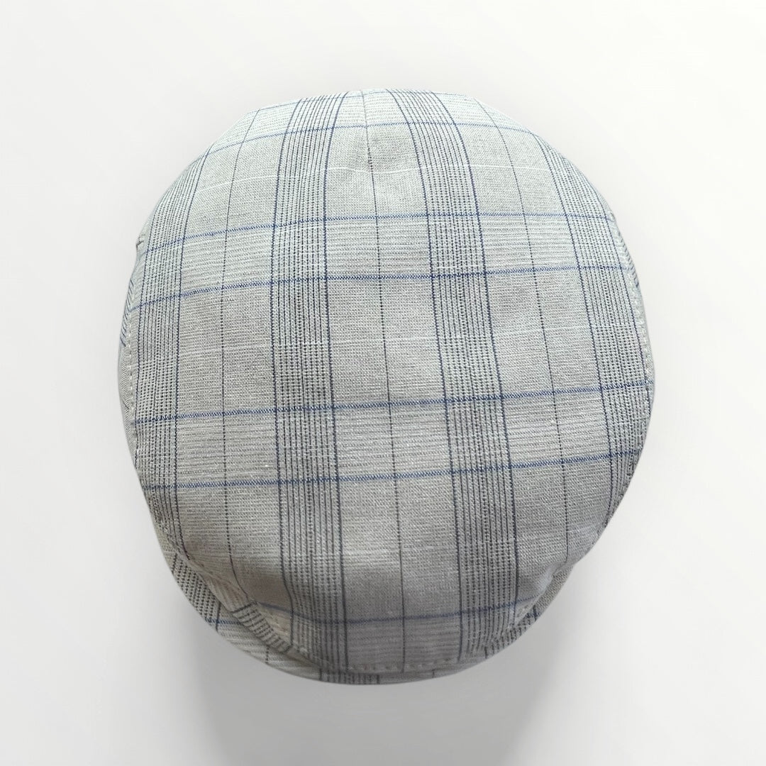 Beige Coppola hat by Sbarià with a classic checkered pattern, stylish and comfortable headwear accessory.