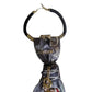 Close-up of CLAUDIA DE ROSA JEWELRY Cravatta Gioiello Imperial Cross featuring intricate design and elegant details.