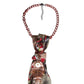 Close-up of CLAUDIA DE ROSA JEWELRY Rose Gold Cravatta Gioiello with detailed knot and matching necklace.