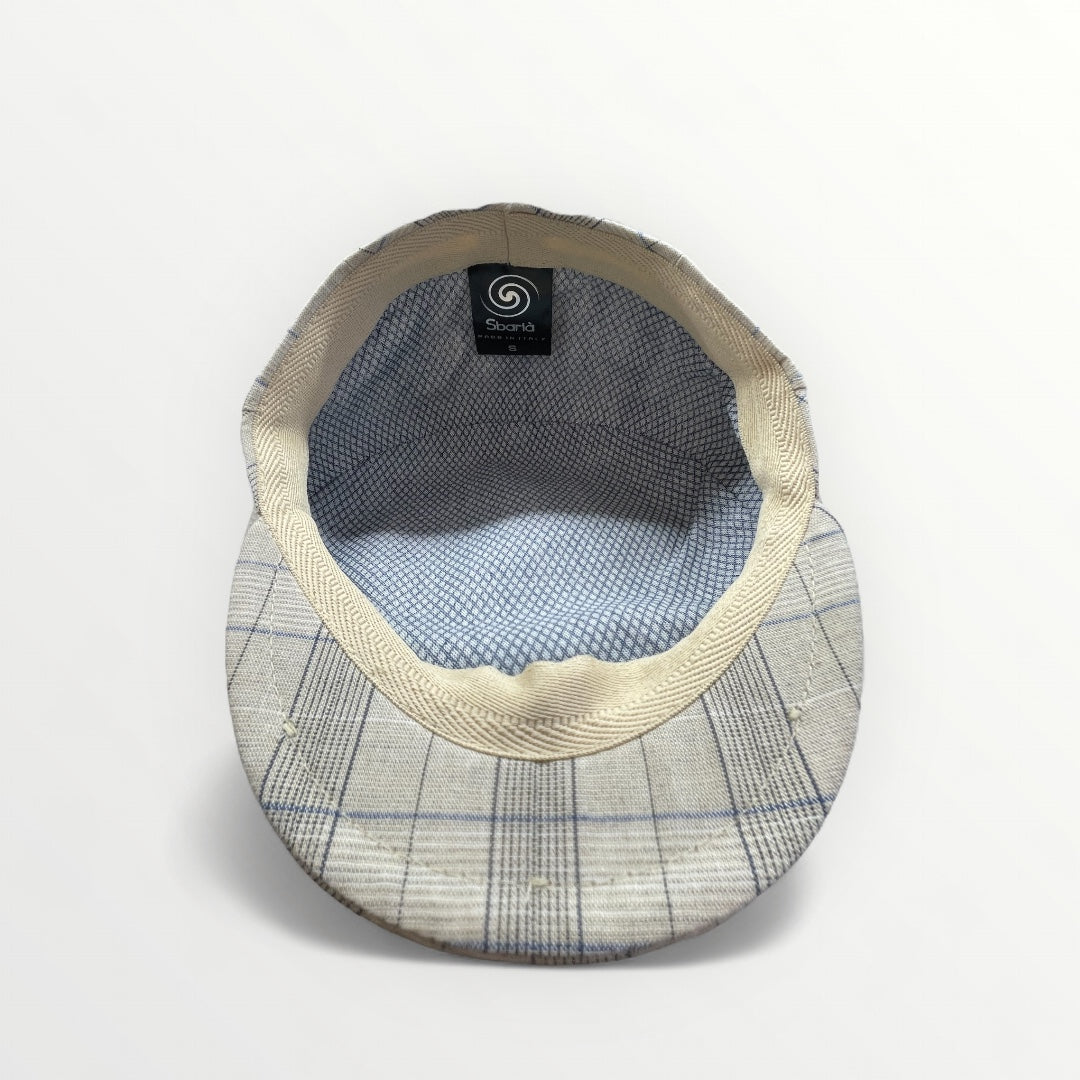 Coppola Sbarià Siciliana beige with a checkered pattern, traditional Sicilian headwear featuring a square design.