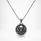 Silver and bronze pirate-themed necklace with black sails design by BDG Accessories, featuring a detailed maritime motif.