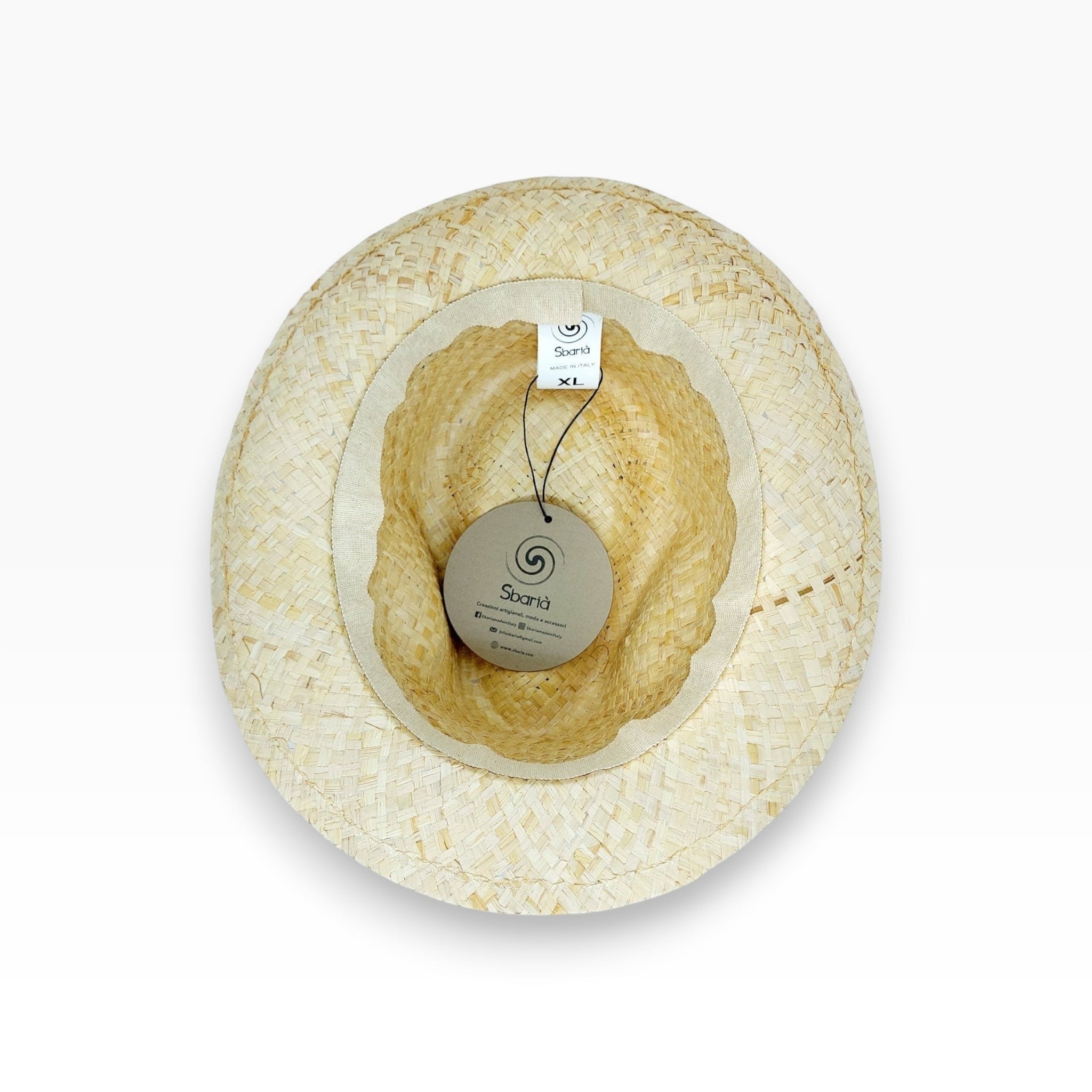 Interior view of Sbarià natural raffia fedora hat with striped band, artisanal craftsmanship, made in Italy, size XL.