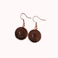 Claudia De Rosa Jewelry magnetic earrings with pink gold-tone pendants, stylish and delicate accessory for pierced ears.