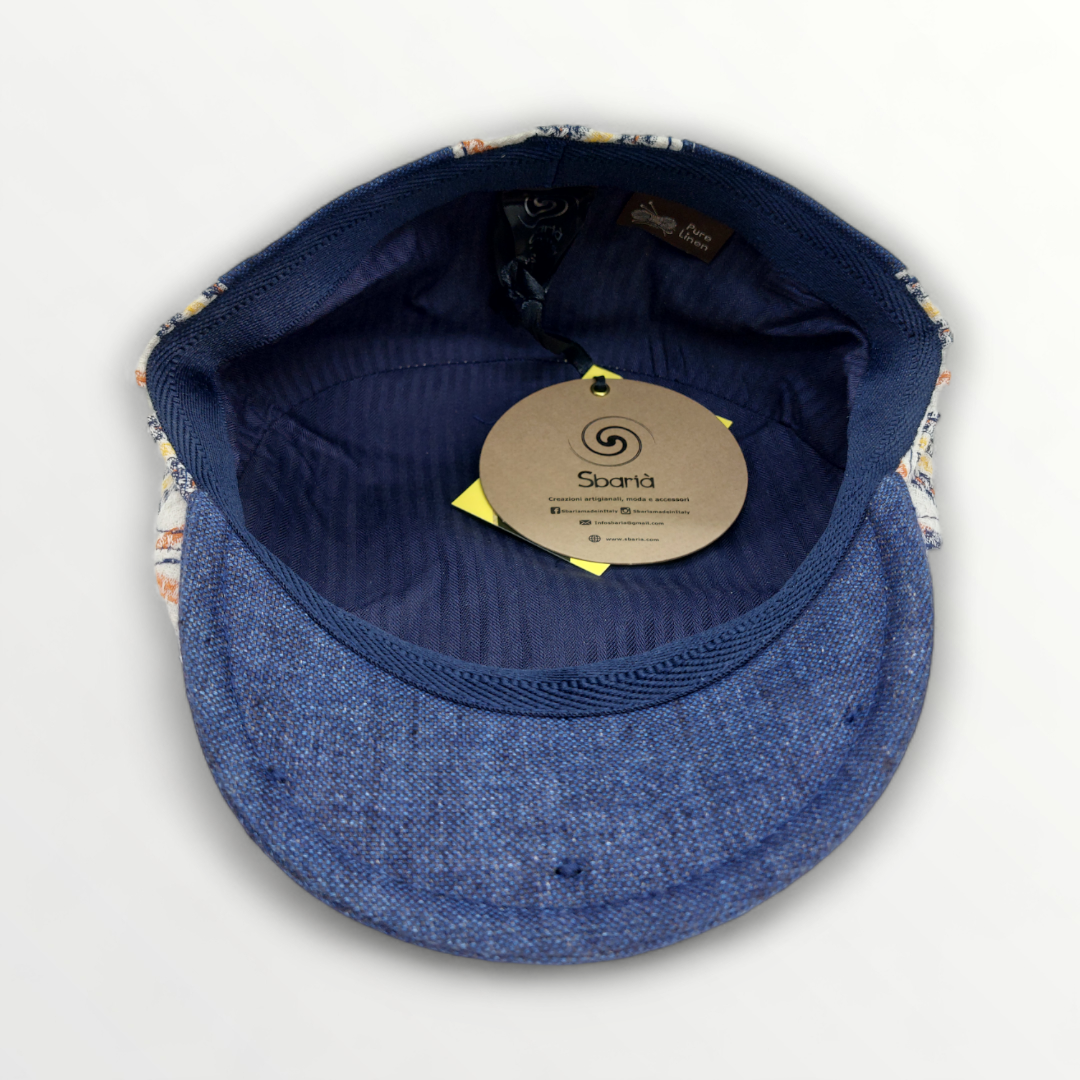 Primavera/Estate Coppola hat made of linen and cotton, featuring a soft, wide brim for sun protection and breathable comfort.