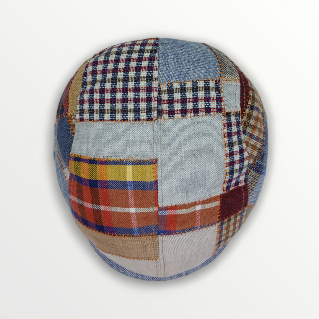 Coppola Primavera/Estate patchwork hat made of linen and cotton with colorful patchwork design and wide brim.