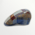Coppola Primavera/Estate patchwork hat made of linen and cotton with colorful fabric panels and a wide brim.