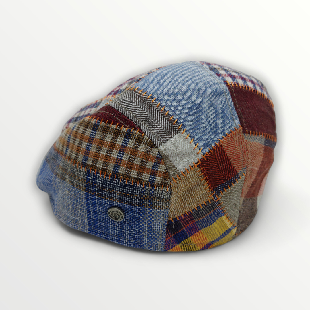 Coppola Primavera/Estate patchwork hat made of linen and cotton with colorful stitched fabric design.