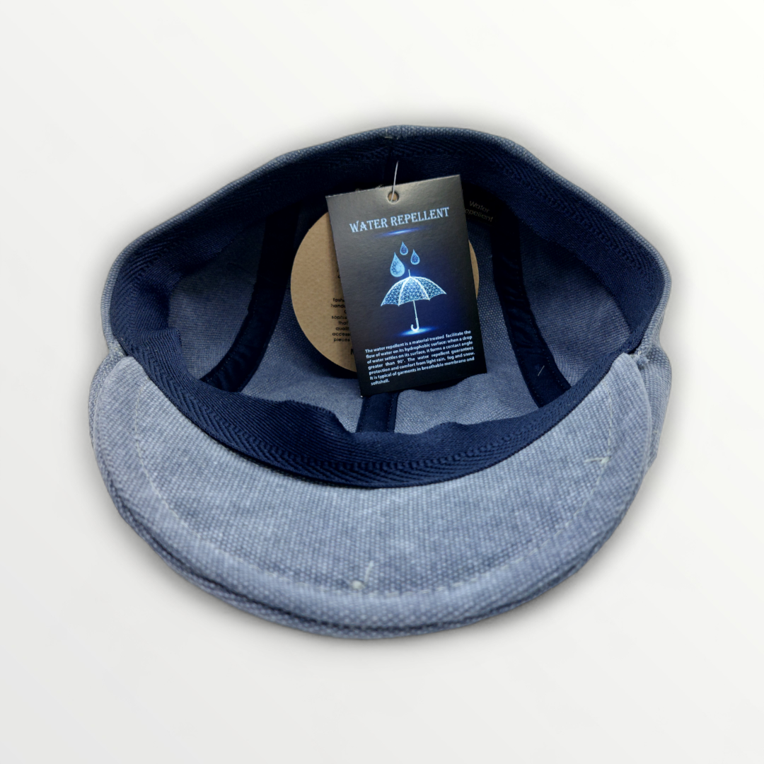Primavera Estate Coppola in blue canvas with rounded top handle and structured design, perfect for stylish everyday use.