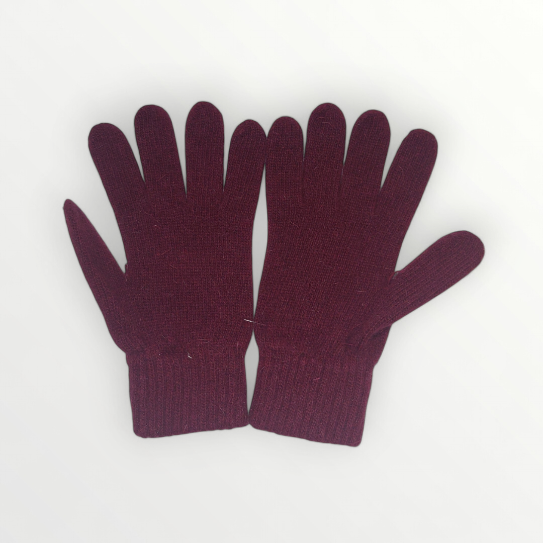 Elegant women's gloves made of soft angora, lambswool, and nylon, perfect for autumn and winter warmth and style.