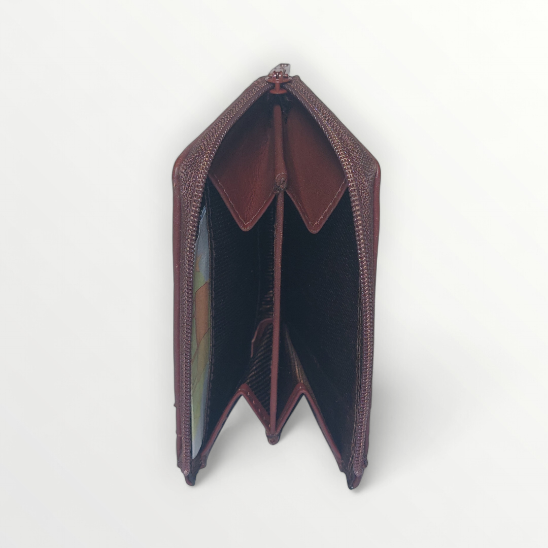 Leather zip wallet with RFID protection, featuring multiple card slots and sleek design for secure everyday use.