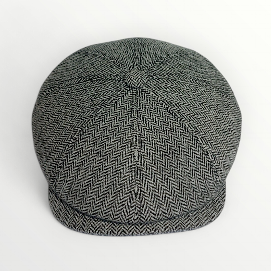 Autunno/Inverno Coppola in pura lana vergine con fantasia spina di pesce, stylish warm headwear for cold weather.