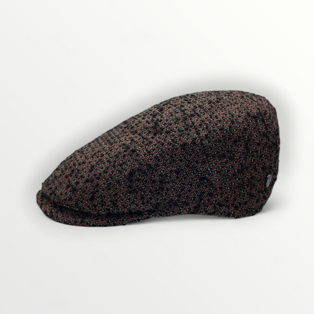Sbarià Coppola Taormina in variegated brown wool, showcasing a stylish, warm hat with a textured pattern.