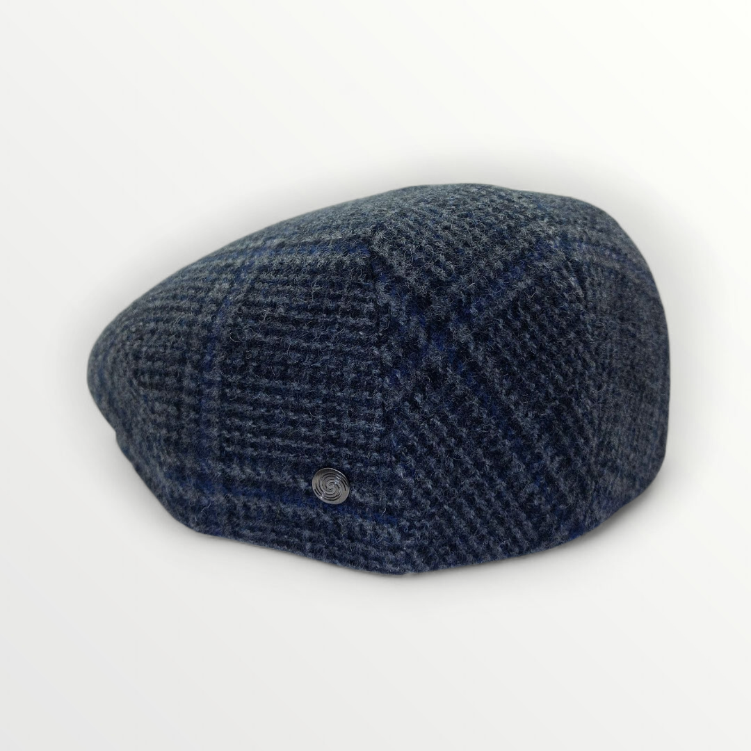 Siciliana wool cap by Sbarià featuring gray and blue plaid patterns with attached ear covers for warmth.