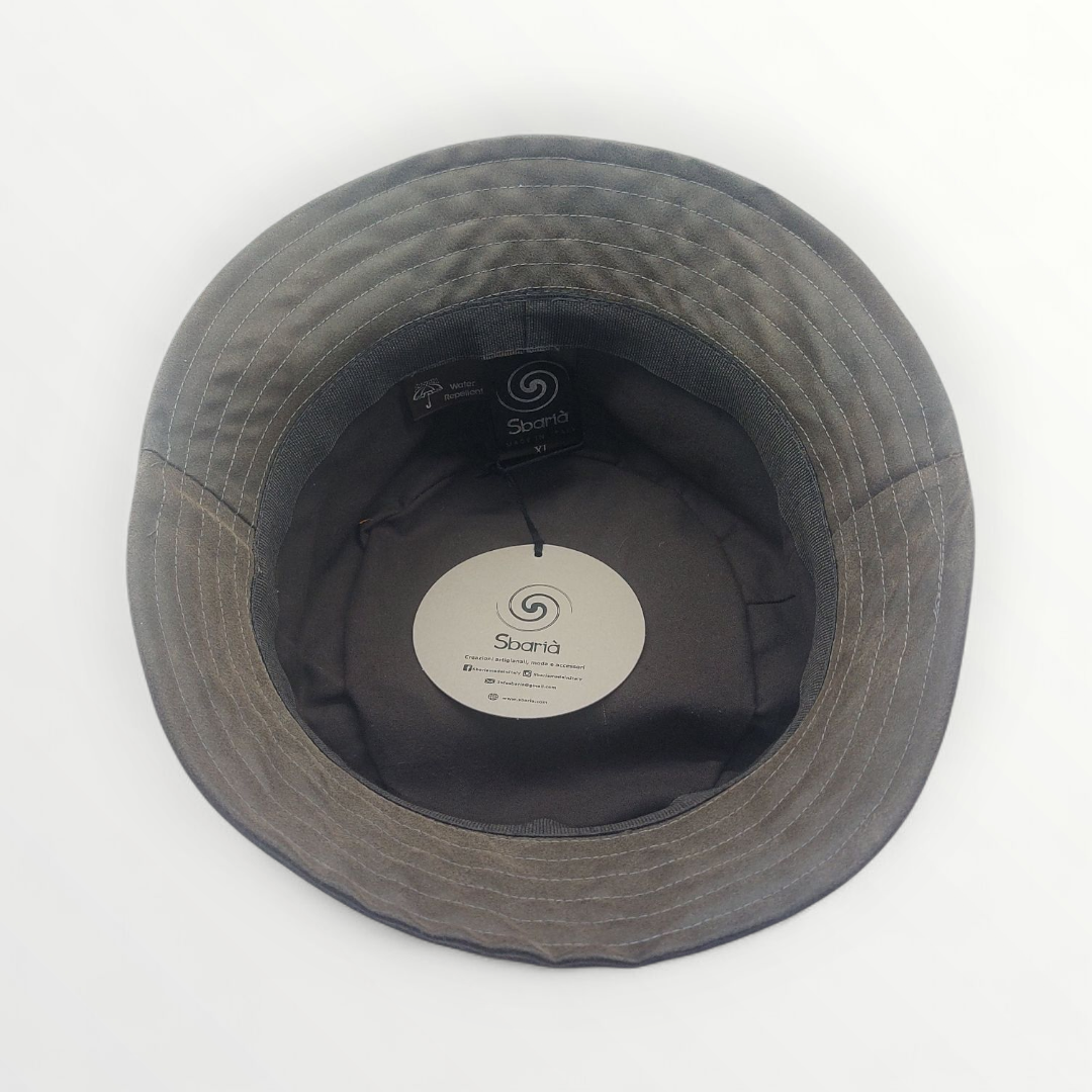 Cotton fisherman hat with wax finish in testa di Moro color by Sbarià, featuring a wide brim and textured fabric.