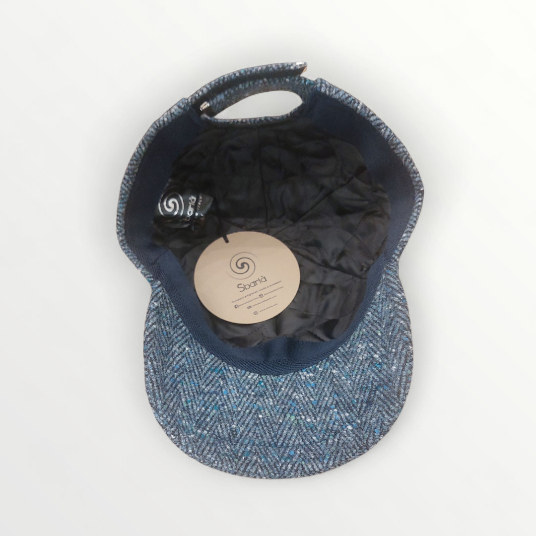 Light blue Sbarià baseball cap made of herringbone wool fabric, showcasing a stylish and cozy berretto design.