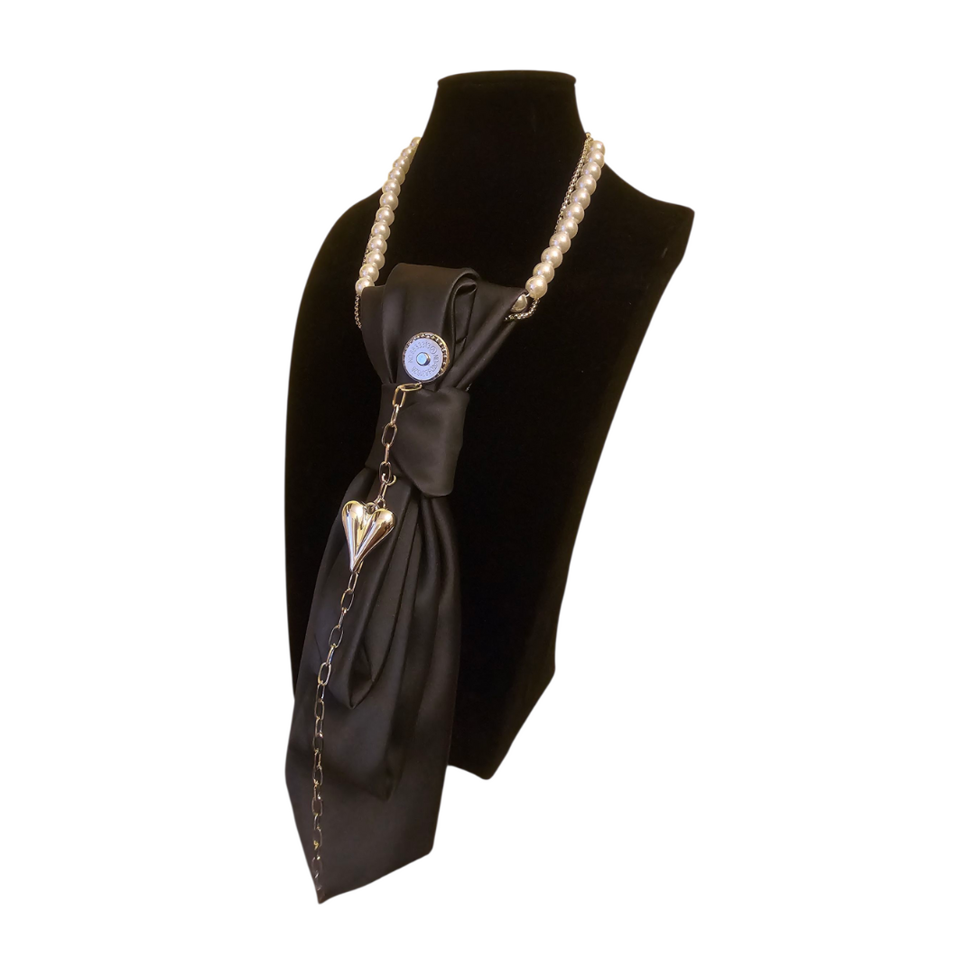 Claudia De Rosa Jewelry Cravatta Gioiello Midnight Heart displayed on a mannequin, showcasing elegant jewelry design and intricate details.