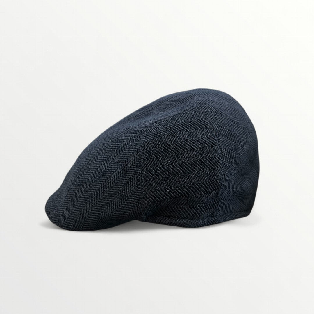 Coppola Zankle by Sbarià, stylish black Coppola hat with wide brim and decorative band, displayed on a neutral background.