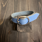 Blue and red BDG Accessories ellipse bracelet featuring elegant wooden design, worn on a wrist.
