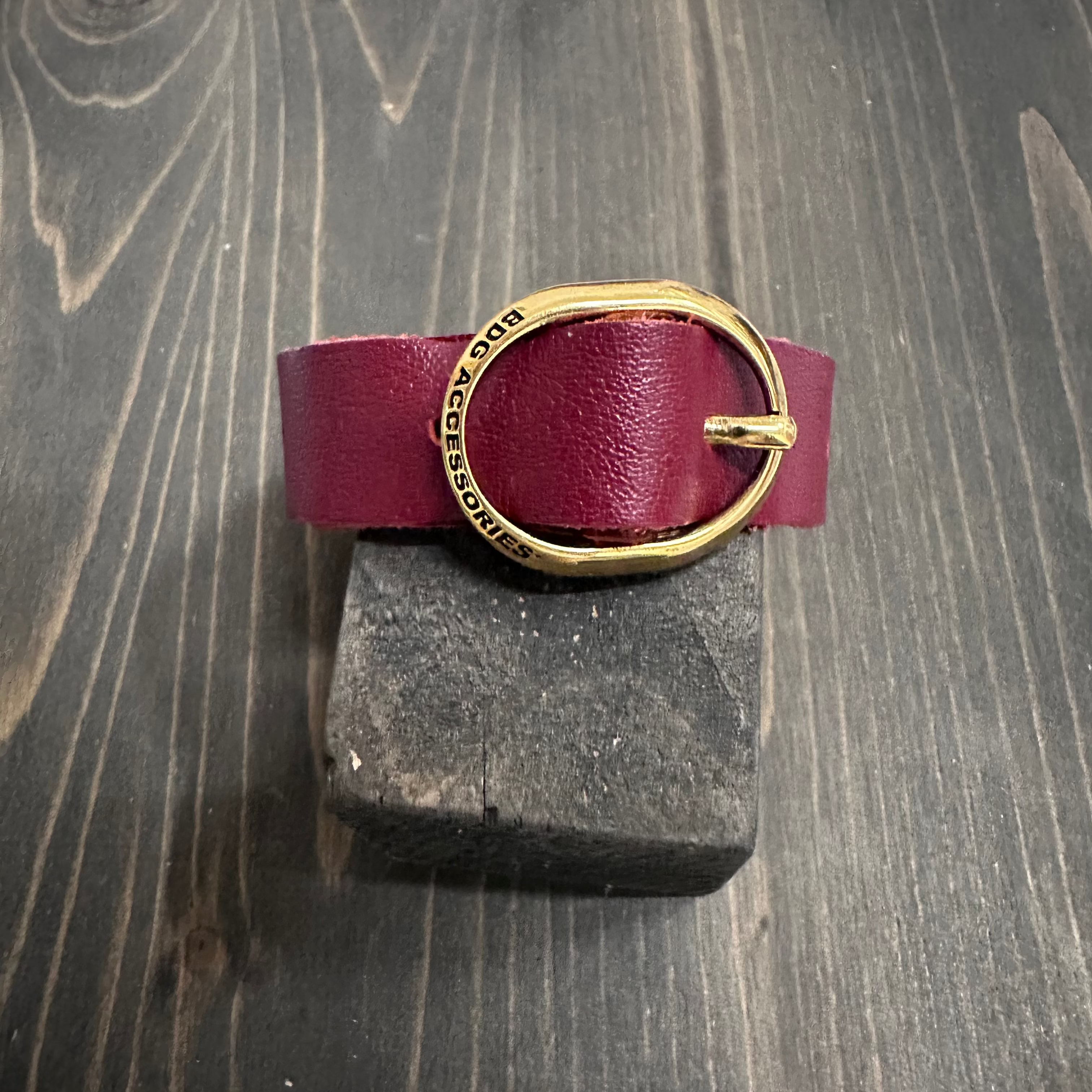 Elegant BDG Accessories ellipse bracelet in red and blue with detailed clasp, showcasing stylish jewelry design.