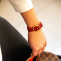 BDG Accessories elegant ellipse bracelet in red and blue with gold accents, showcasing a stylish jewelry accessory.