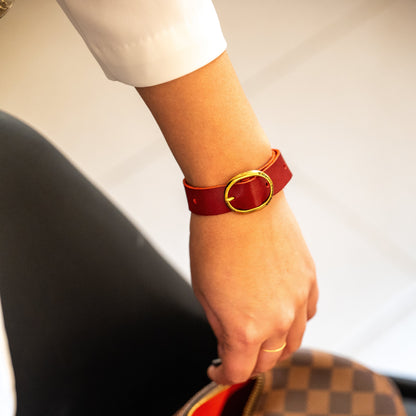 BDG Accessories elegant ellipse bracelet in red and blue with gold accents, showcasing a stylish jewelry accessory.