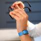 BDG Accessories elegant ellipse bracelet in red and light blue with a sleek, stylish design on a white background.