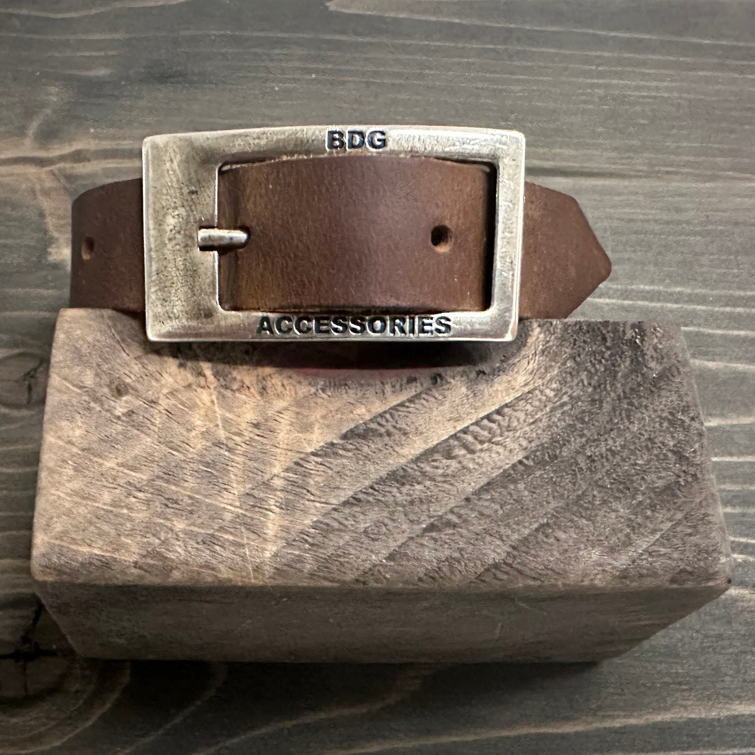 BDG Accessories leather bracelet in old style with a rustic, vintage design, featuring adjustable strap and metal details.
