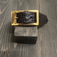 BDG Accessories leather bracelet in old style with rustic design, displayed on a wooden block.