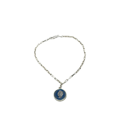 Vintage BDG Accessories silver bracelet with dark blue enamel medallion, 1950s Dolce Vita style, detailed profile design.