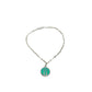 Vintage BDG Accessories silver bracelet with colorful enamel and a green medallion inspired by 1950s Dolce Vita style.