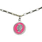 Vintage BDG Accessories silver chain necklace with pink enamel pendant inspired by 1950s Dolce Vita style.