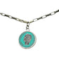 BDG Accessories vintage silver chain necklace with turquoise enamel pendant inspired by 50s Dolce Vita style