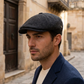 Coppola Oxford antracite con spicchi più definiti e cappotto blu navy