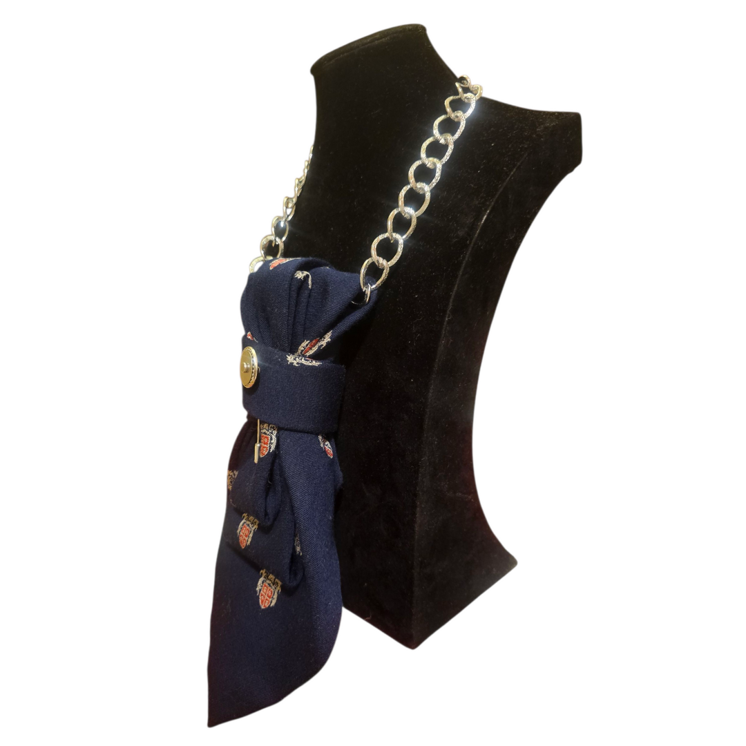 Blue Araldico Cravatta Gioiello by Claudia De Rosa Jewelry displayed on mannequin. Elegant silk necktie with intricate design.