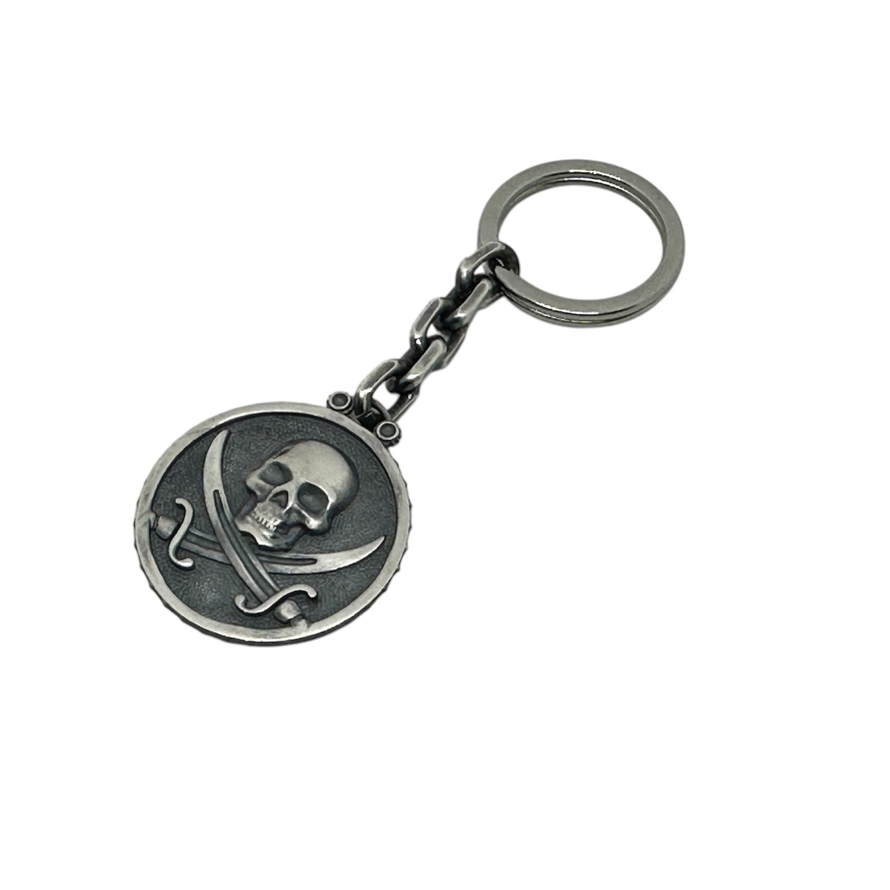 Silver keychain with black sails design by BDG Accessories, featuring a sleek and stylish key holder in polished silver finish.