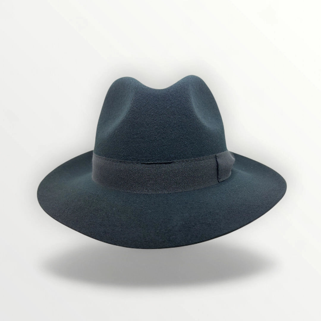 Black felt fedora hat by Sbarià with a ribbon and bow, waterproof and crushable wool felt, stylish and practical accessory.