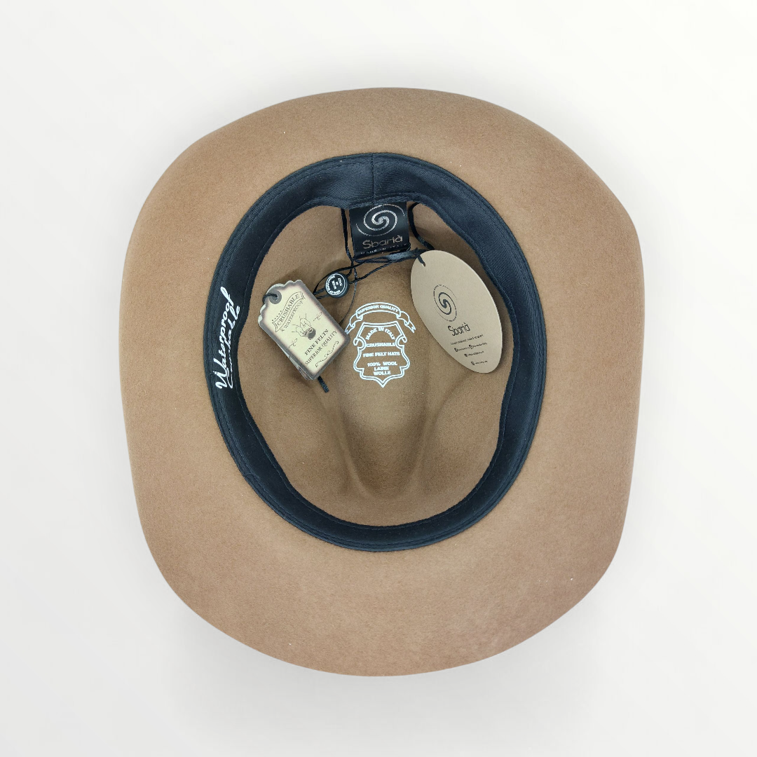 Sbarià waterproof felt fedora hat with a bow, round crown, crushable design in tan wool felt with a decorative ribbon.
