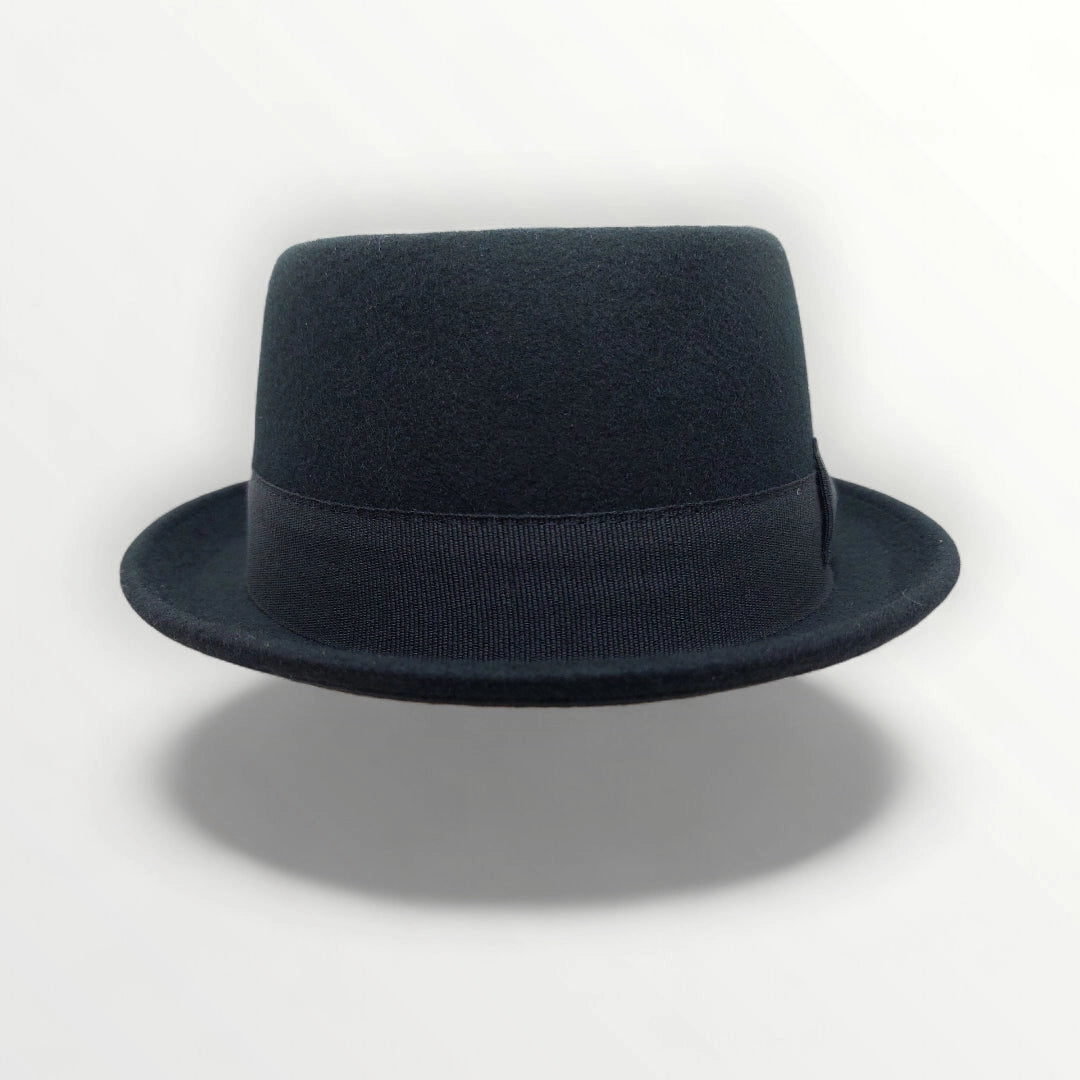 Black felt wool pork pie hat by Sbarià with a ribbon bow, waterproof and crushable for stylish, durable headwear.