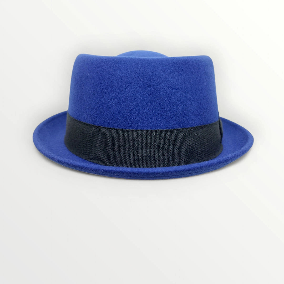 Sbarià waterproof felted wool pork pie hat in petrol blue with a decorative bow, crushable and stylish accessory.