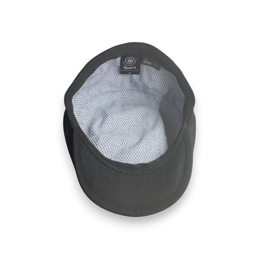 Sbarià black pure linen flat cap with a patterned cotton lining and metal logo pin.